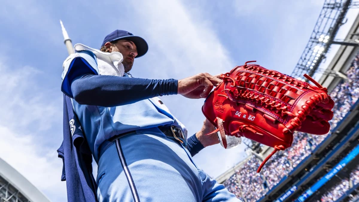 Toronto Blue Jays pitcher Kevin Gausman (34) walks to the dugout before playing the St. Louis Cardinals at Rogers Centre.