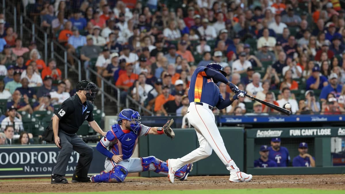 Houston Astros left fielder Yordan Alvarez (44) hits a two run RBI double agains the Texas Rangers in the seventh inning at Daikin Park