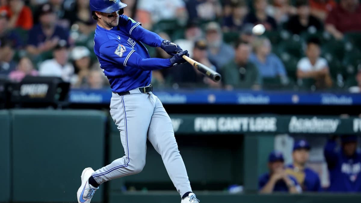 Toronto Blue Jays third baseman Ernie Clement (22) hits a two-run home run to left field against the Houston Astros during the 10th inning at Daikin Park.