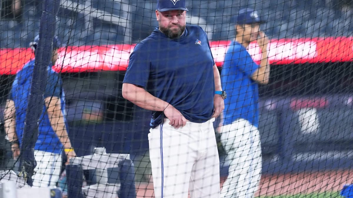 Toronto Blue Jays manager John Schneider (14) oversees the batting practice before a game against the Boston Red Sox at Rogers Centre.