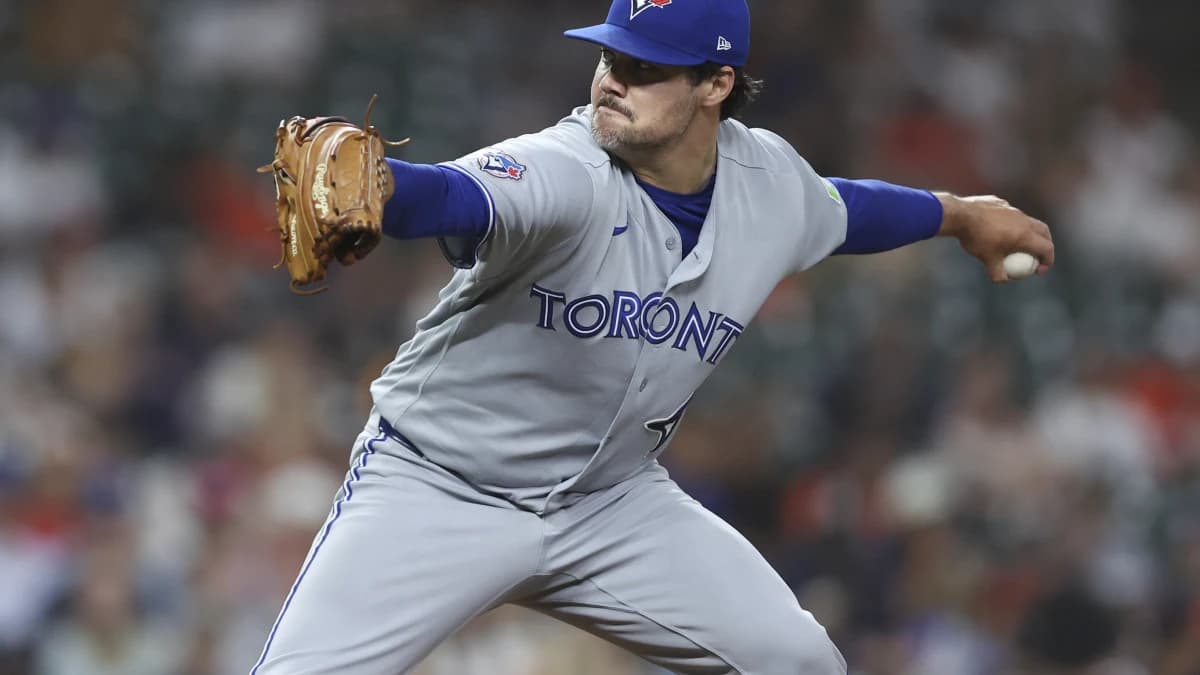 Toronto Blue Jays pitcher Brendon Little (54) delivers a pitch during the eighth inning against the Houston Astros at Daikin Park.