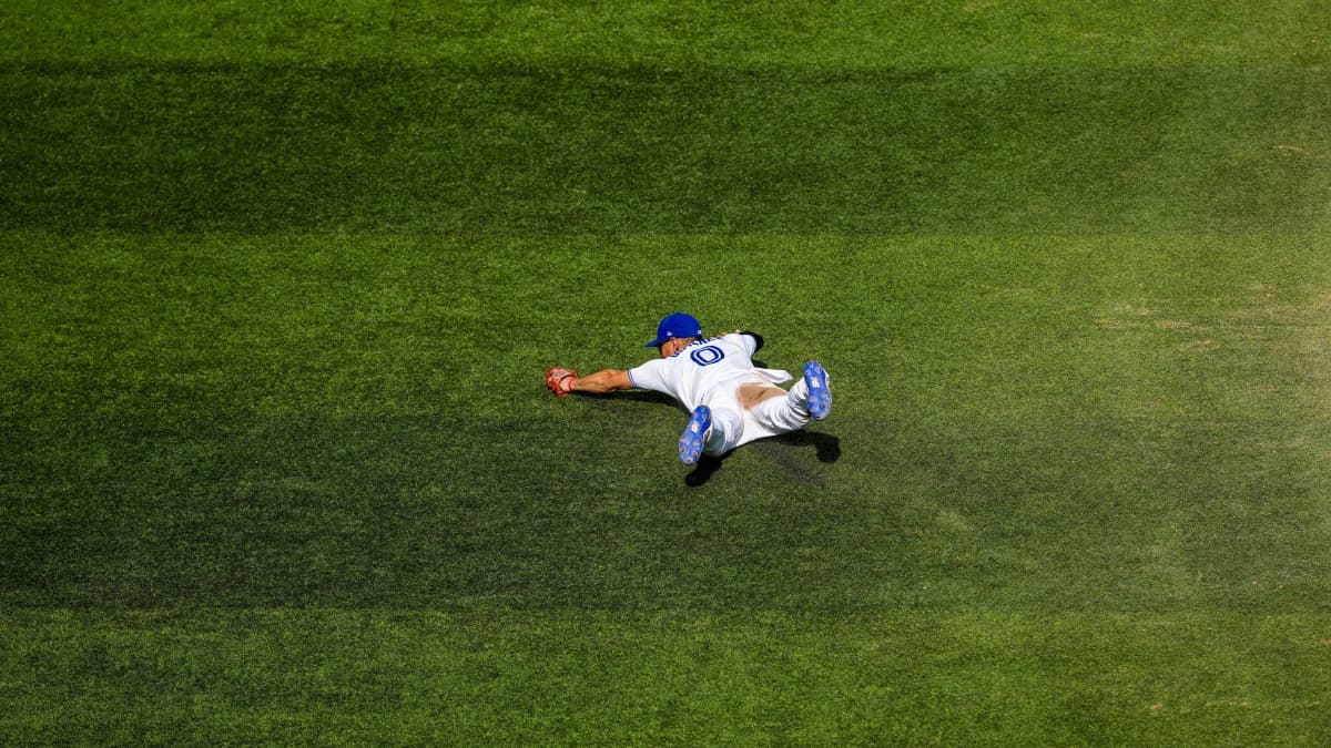 Toronto Blue Jays shortstop Andrés Giménez (0) fails to field a ball during the sixth inning against the Boston Red Sox at Rogers Centre.