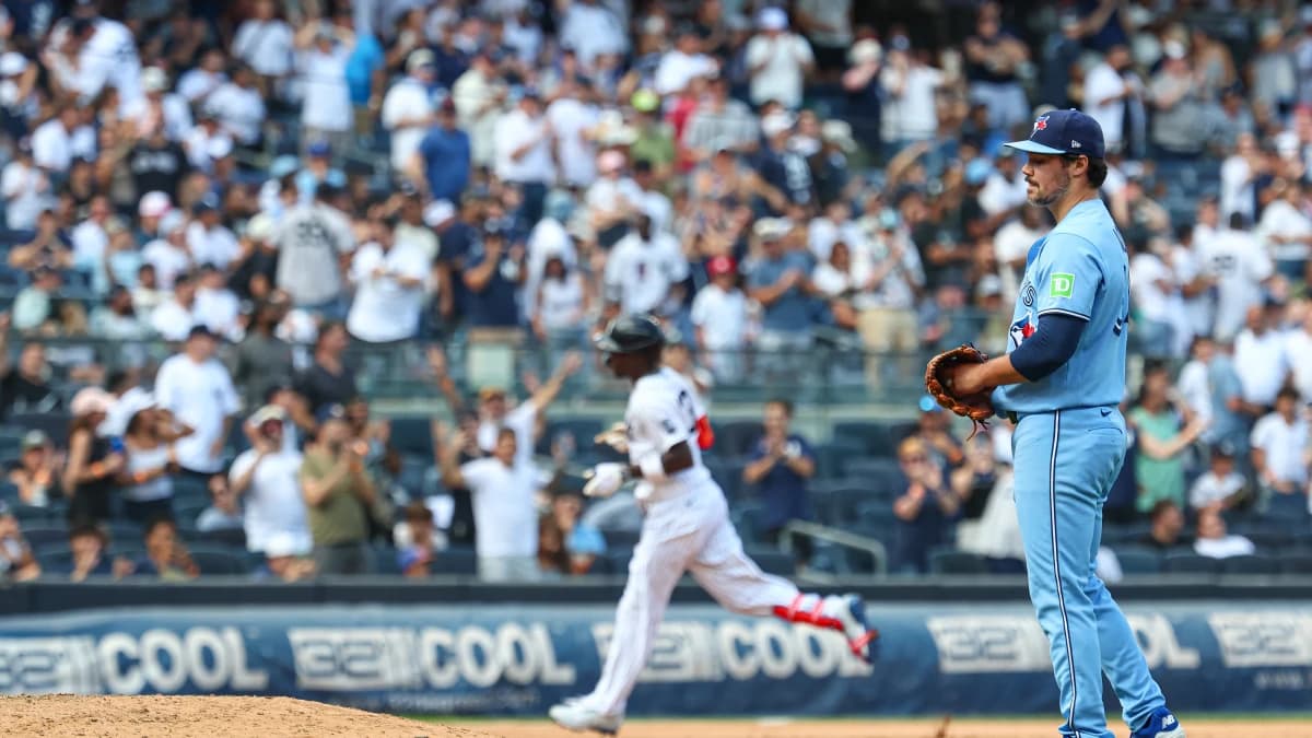 Toronto Blue Jays pitcher Brendon Little (54) reacts after New York Yankees second baseman Jazz Chisholm Jr. (13) rounds the bases after a two run home run during the seventh inning at Yankee Stadium.