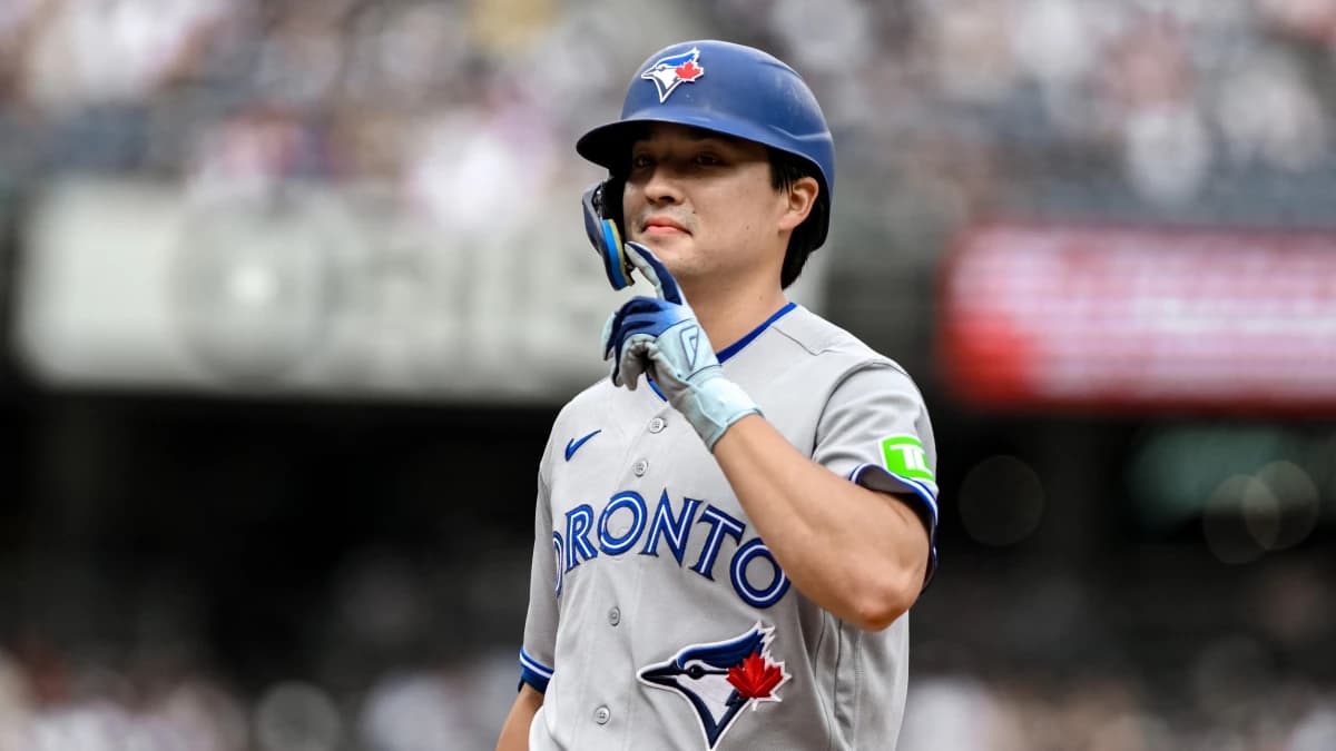 Toronto Blue Jays center fielder Brett Bateman (21) reacts after hitting a single against the New York Yankees during the third inning at Yankee Stadium