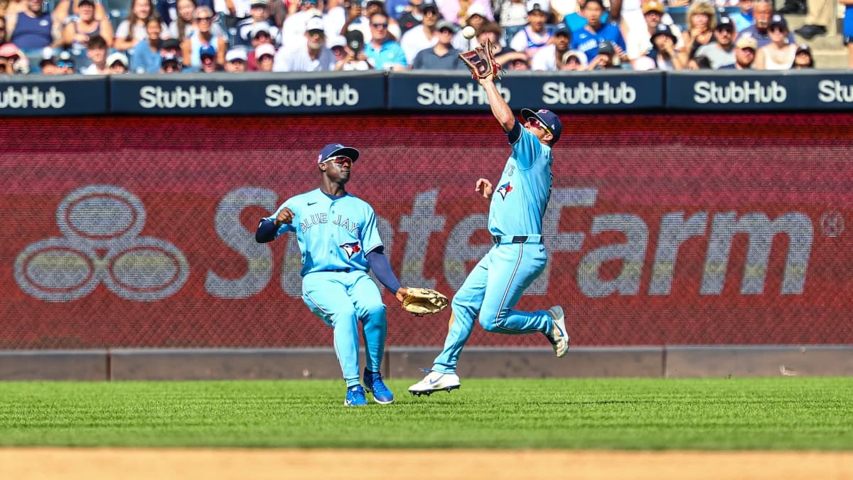 Toronto Blue Jays right fielder Myles Straw (3) makes a catch for an out during the sixth inning against the New York Yankees at Yankee Stadium
