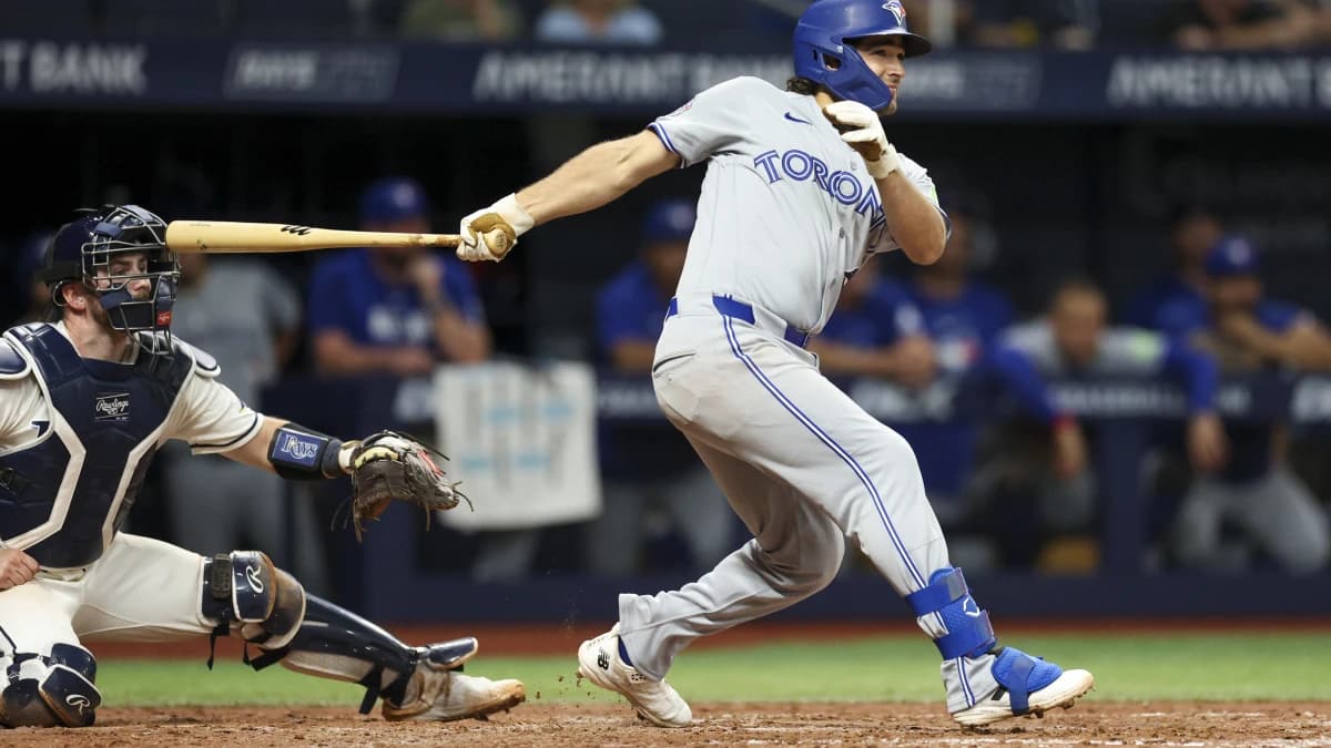 Toronto Blue Jays third baseman Josh Smith (9) hits a two-run home run against the Tampa Bay Rays in the seventh inning at Tropicana Field.