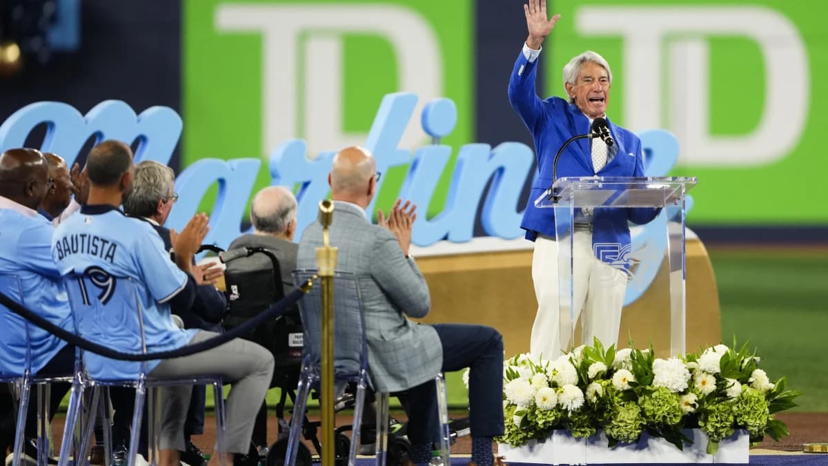 Buck Martinez waves to the fans during a pregame ceremony to honour him before a game between the Toronto Blue Jays and Seattle Mariners at Rogers Centre