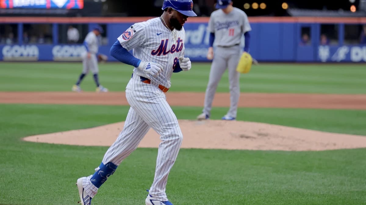 New York Mets center fielder Luis Robert Jr. (88) rounds the bases after hitting a solo home run against Los Angeles Dodgers starting pitcher Roki Sasaki (11) during the second inning at Citi Field.