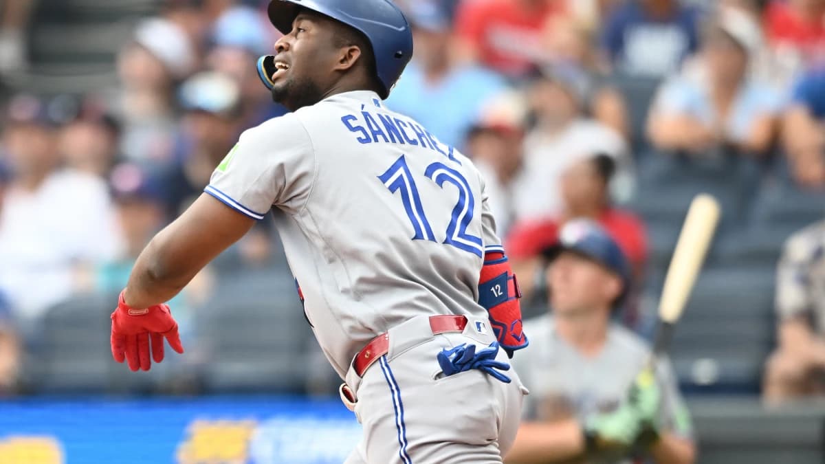 Toronto Blue Jays left fielder Jesus Sanchez (12) hits an RBI single during the fifth inning against the Cleveland Guardians at Progressive Field.