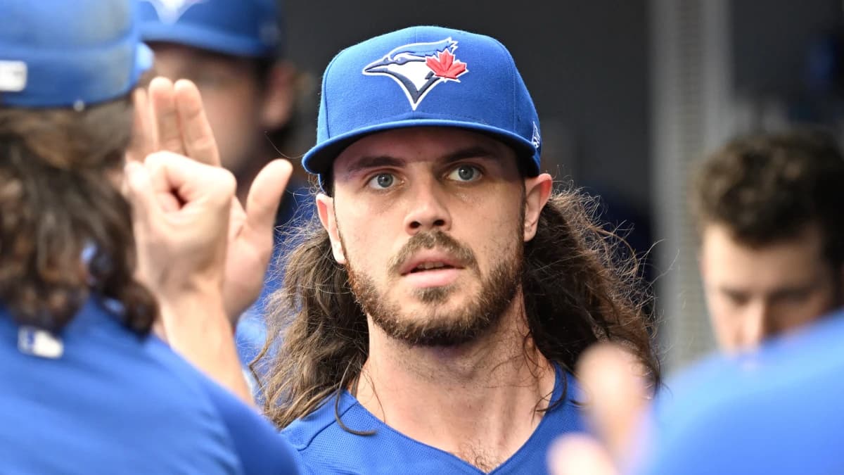 Toronto Blue Jays relief pitcher Spencer Arrighetti (45) is greeted by team mates in the dugout after being relieved against the Baltimore Orioles in the sixth inning at Rogers Centre