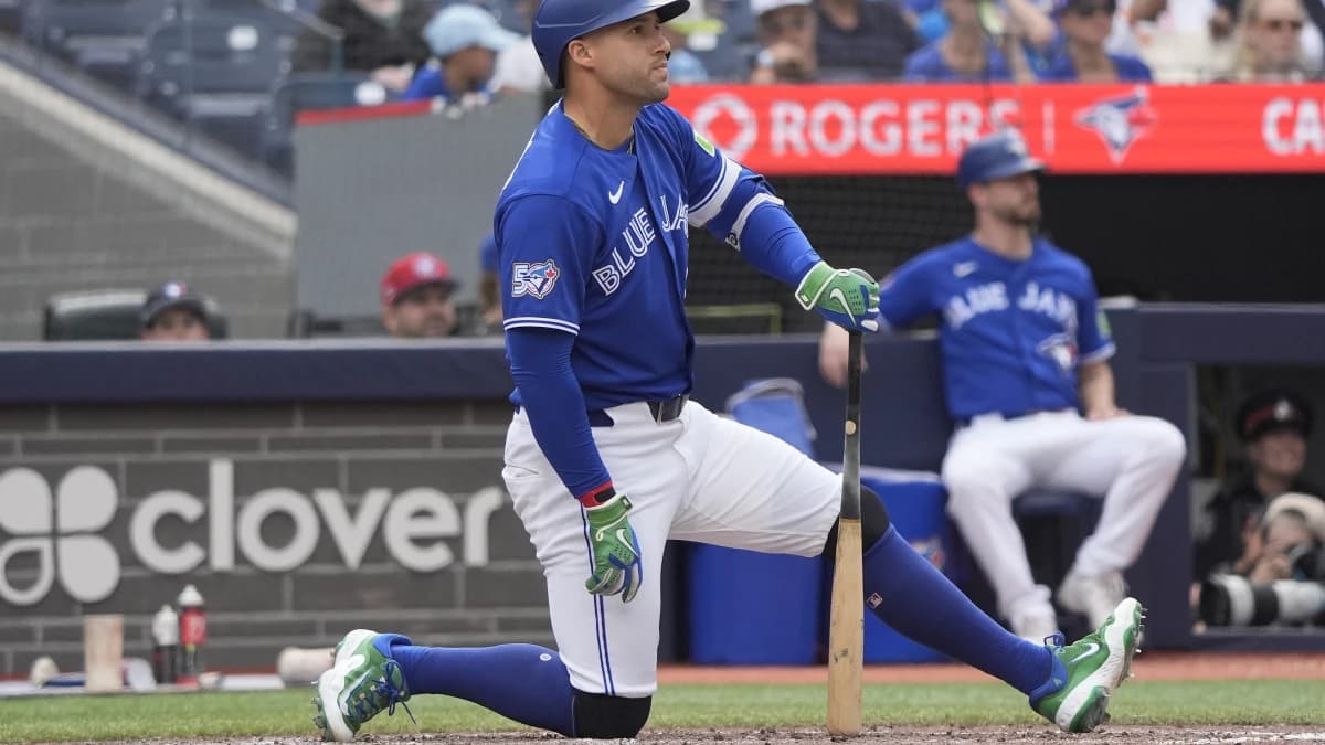 Toronto Blue Jays designated hitter George Springer (4) kneels after taking a strike against the Baltimore Orioles during the eighth inning at Rogers Centre.