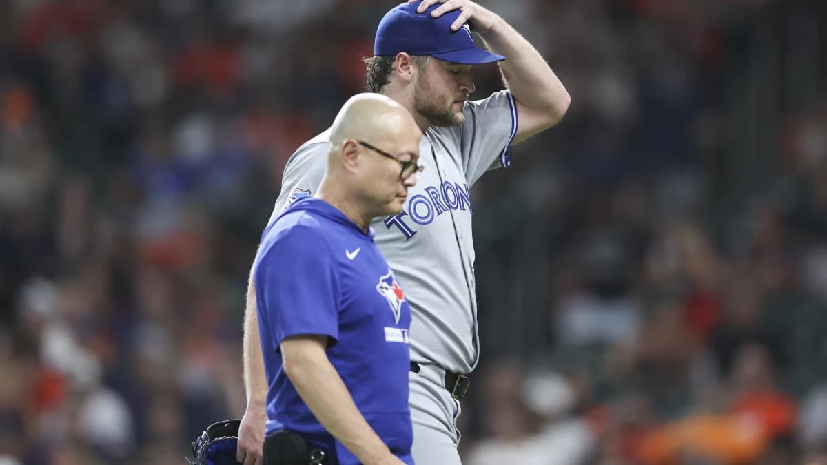 Toronto Blue Jays starting pitcher Trey Yesavage (39) walks off the field after an apparent injury during the third inning against the Houston Astros at Daikin Park.