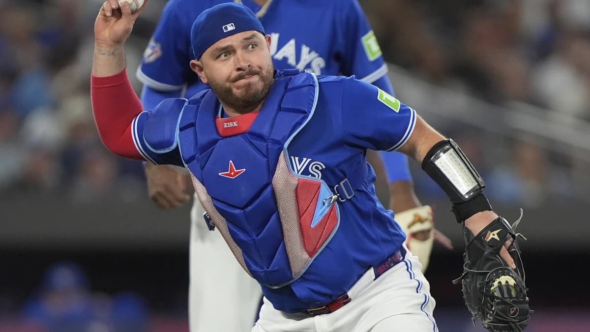 Toronto Blue Jays catcher Alejandro Kirk (30) goes to throw out Detroit Tigers shortstop Kevin McGonigle (not pictured) at first base during the sixth inning at Rogers Centre