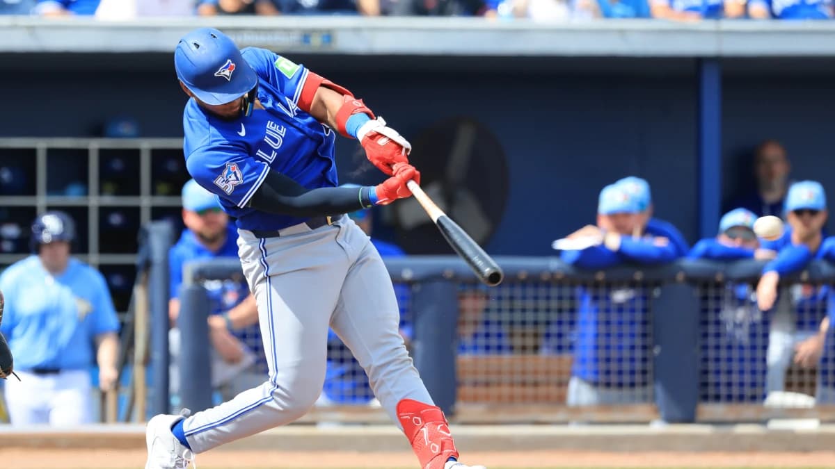Toronto Blue Jays shortstop Leo Jimenez (49) hits an RBI single during the second inning against the Tampa Bay Rays at Charlotte Sports Park.