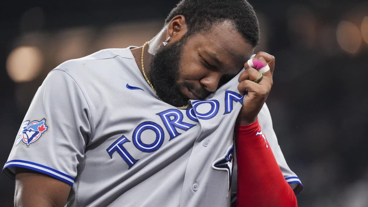 Toronto Blue Jays first baseman Vladimir Guerrero Jr. (27) walks to the dugout after the end of the fifth inning against the Texas Rangers at Globe Life Field.