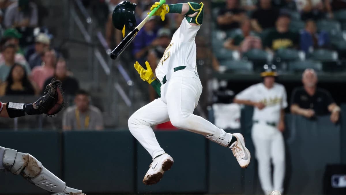 Athletics catcher Brian Serven (10) gets hit by pitch during the sixth inning against the Los Angeles Angels at Sutter Health Park.