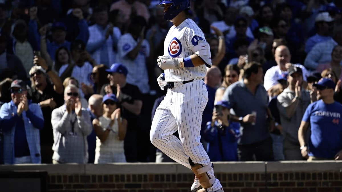 Chicago Cubs right fielder Seiya Suzuki (27) rounds the bases after he hit a home run during the fifth inning against the Miami Marlins at Wrigley Field.