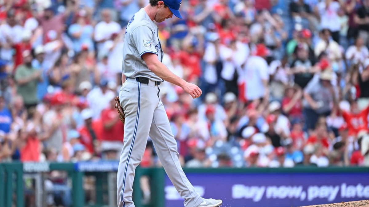 Toronto Blue Jays pitcher Shane Bieber (57) reacts after Philadelphia Phillies designated hitter Kyle Schwarber (12) (not pictured) hit a home run during the fifth inning against the Toronto Blue Jays at Citizens Bank Park.