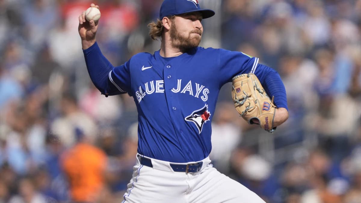 Toronto Blue Jays starting pitcher Spencer Miles (62) pitches to the Cincinnati Reds during the third inning at Rogers Centre.