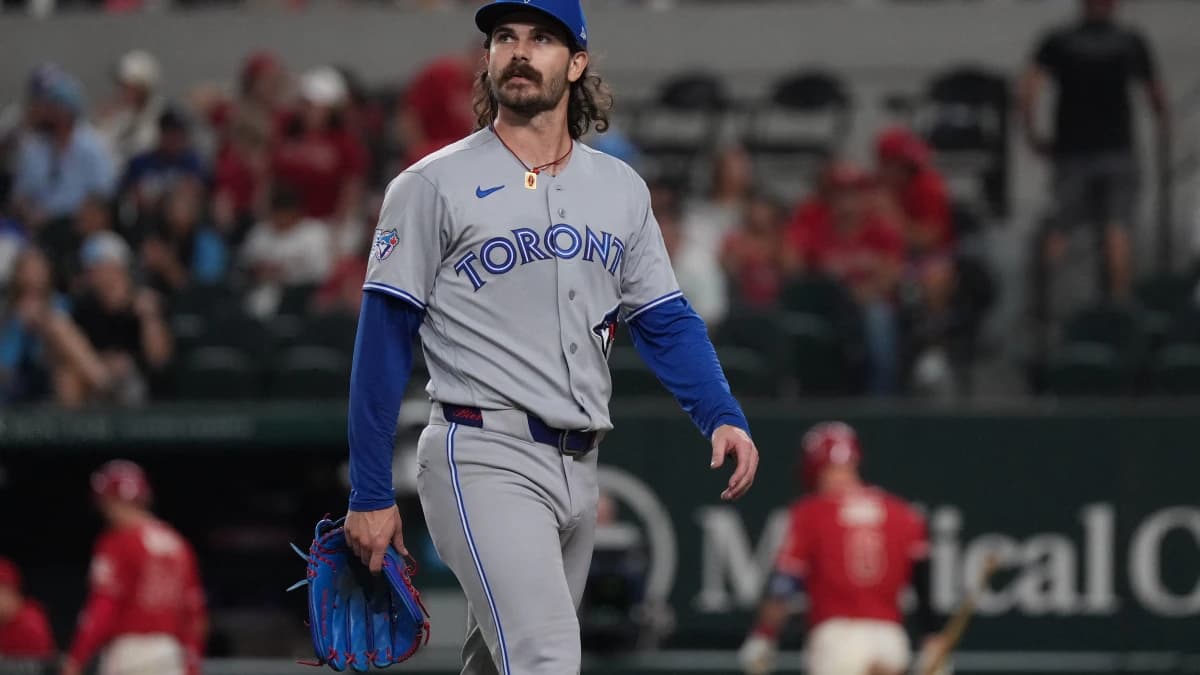 Toronto Blue Jays pitcher Dylan Cease (84) walks off the field after giving up four runs to the Texas Rangers during the second inning at Globe Life Field. M