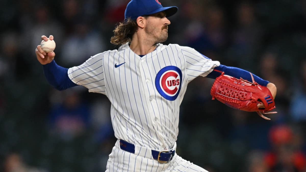 Chicago Cubs pitcher Kevin Gausman (12) pitches against the Miami Marlins during the first inning at Wrigley Field.