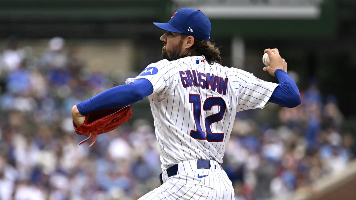 Chicago Cubs pitcher Kevin Gausman (12) delivers the ball during the first inning against the Cincinnati Reds at Wrigley Field.