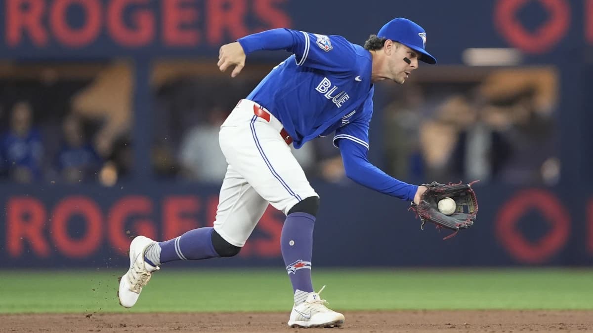 Toronto Blue Jays second baseman Ernie Clement (22) catches a ground ball hit by Detroit Tigers center fielder Max Clark (not pictured)during the second inning at Rogers Centre.