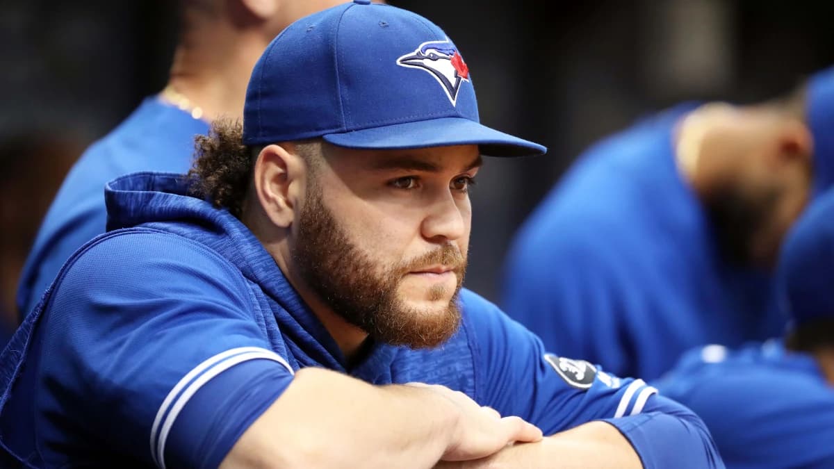Toronto Blue Jays catcher Russell Martin (55) looks on from the dugout against the Tampa Bay Rays at Tropicana Field.