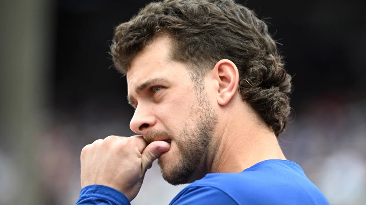 Toronto Blue Jays infielder Ernie Clement (22) nibbles on his thumb as he watches play against the Baltimore Orioles in the sixth inning at Rogers Centre.