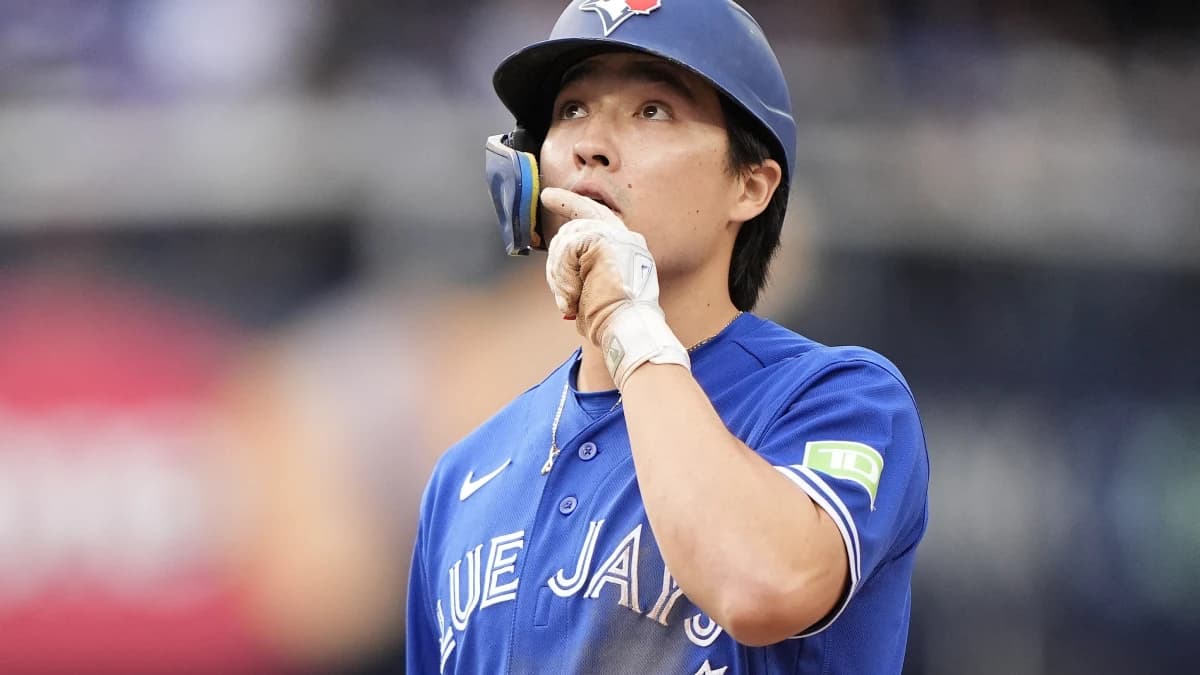 Toronto Blue Jays center fielder Brett Bateman (21) reacts after hitting a single against the Cincinnati Reds during the eighth inning at Rogers Centre