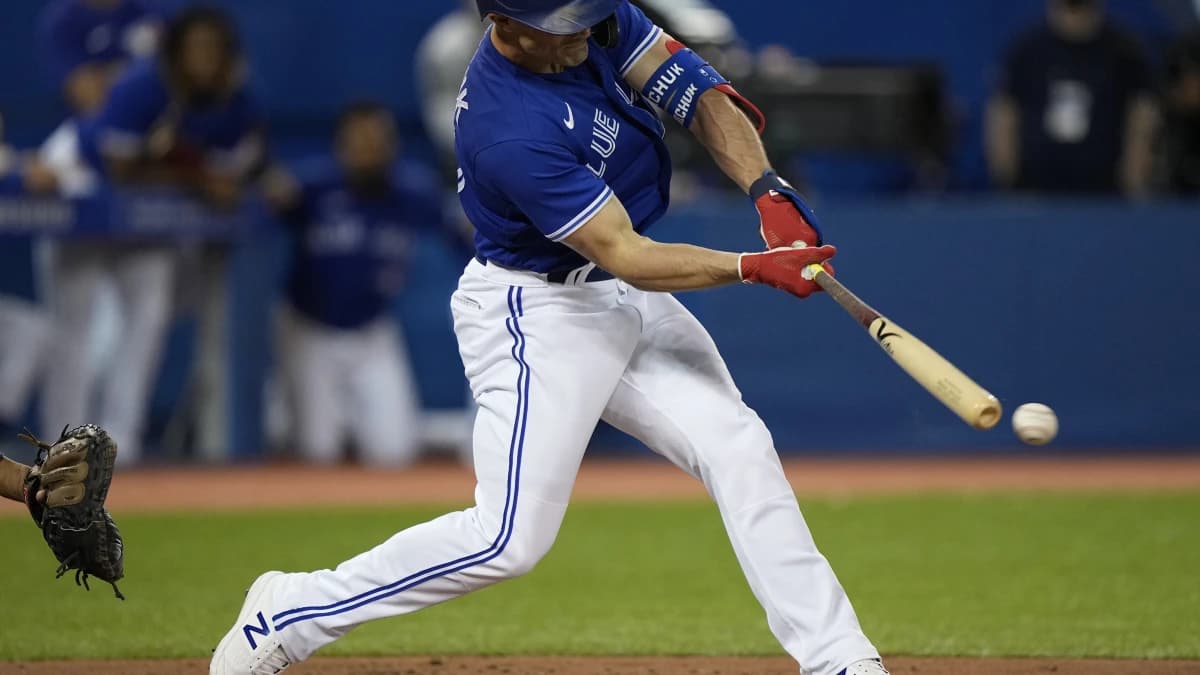 Toronto Blue Jays center fielder Randal Grichuk (15) hits an RBI double against the Tampa Bay Rays in the fourth inning at Rogers Centre.