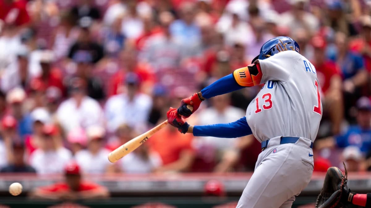 Chicago Cubs designated hitter Kevin Alcantara (13) hits an 2-run RBI base hit in the fourth inning between the Chicago Cubs and Cincinnati Reds at Great American Ball Park in Cincinnati on Sunday, July 12, 2026.