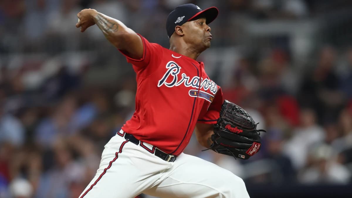 Atlanta Braves pitcher Raisel Iglesias (26) pitches against the Los Angeles Dodgers during the ninth inning at Truist Park.
