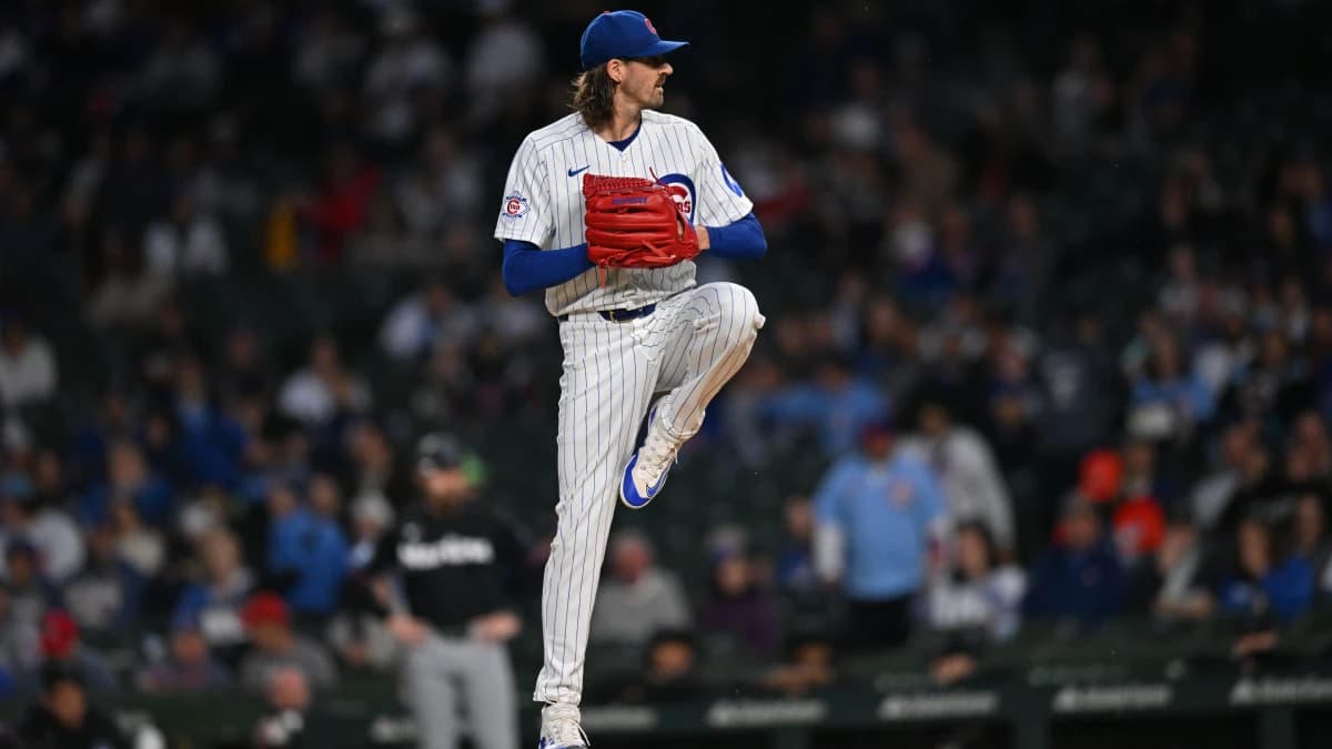 Chicago Cubs pitcher Kevin Gausman (12) pitches against the Miami Marlins during the first inning at Wrigley Field.