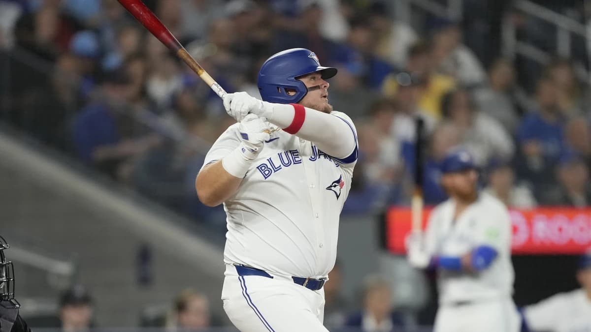 Toronto Blue Jays designated hitter Daniel Vogelbach (20) hits a two-run double against the Pittsburgh Pirates during the fifth inning at Rogers Centre