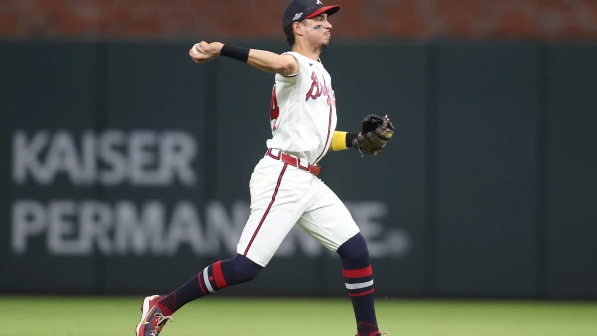 Atlanta Braves outfielder Mauricio Dubon (14) throws to first for an out against the Los Angeles Dodgers during the eighth inning in game four of the NLDS for the 2026 MLB Playoffs at Truist Park.