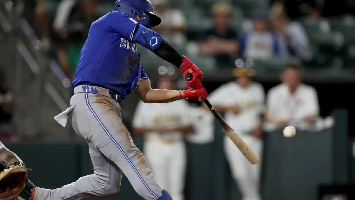 Toronto Blue Jays short stop Andres Gimenez (0) hits a solo home against Athletics pitcher Hogan Harris (not pictured) during the ninth inning at Sutter Health Park.