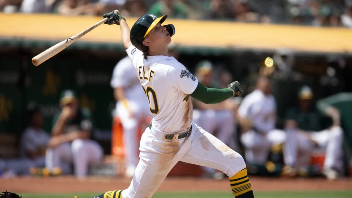 Oakland Athletics second baseman Zach Gelof (20) follows the flight of his RBI double against the Minnesota Twins during the seventh inning at Oakland-Alameda County Coliseum