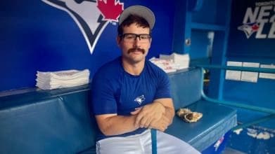 Davis Schneider sitting in Blue Jays dugout #davisschneider #BlueJays