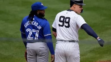 Vlad Guerrero Jr. keeping an eye on Aaron Judge at 1st.