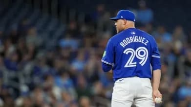 Yariel Rodriguez on the mound for the Blue Jays.