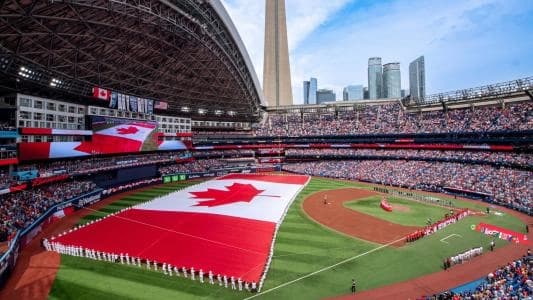 Toronto Blue Jays raise the Canadian Flag for Canada Day.