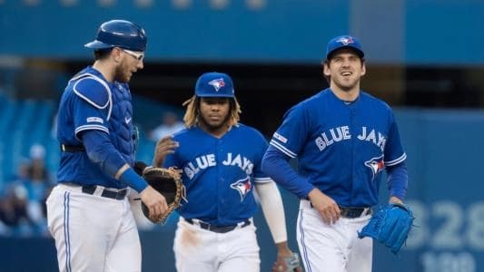 Toronto Blue Jays Danny Jansen, Valdimir Guerrero Jr. and Closer Jordan Romano.