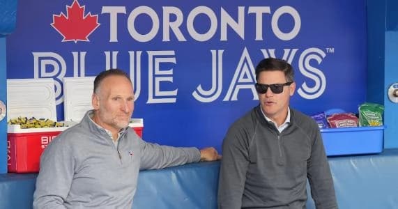 Dan Shapiro and Ross Atkins in the Toronto Blue Jays dugout.