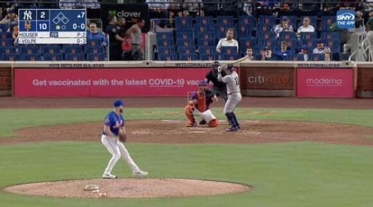 Mets fan gets handcuffed on live TV during Mets and Yankees game.