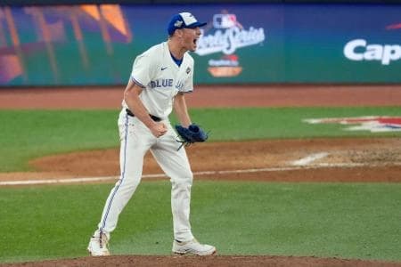 Toronto Blue Jays pitcher Chris Bassitt (40) celebrates after throwing against the Los Angeles Dodgers in the eighth inning during game one of the 2025 MLB World Series at Rogers Centre.