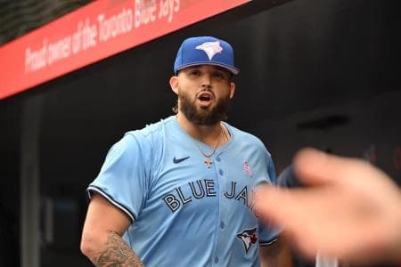 Toronto Blue Jays starting pitcher Alek Manoah (6) speaks to team mates in the dugout after the first inning against the Minnesota Twins at Rogers Centre.