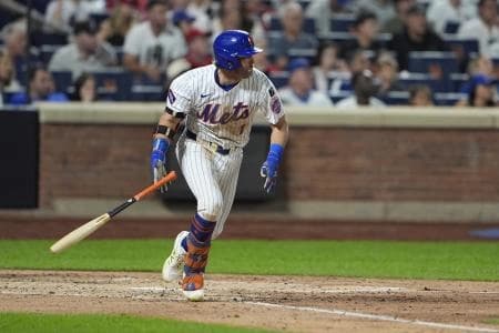 New York Mets second baseman Jeff McNeil (1) hits an RBI single against the Philadelphia Phillies during the fourth inning at Citi Field.