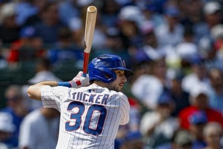 Chicago Cubs right fielder Kyle Tucker (30) bats against the Milwaukee Brewers during the first inning at Wrigley Field.