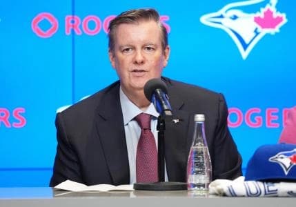 Chairman of the board of directors of Rogers Communications Edward S. Rogers III speaks to the media during the Toronto Blue Jays press conference at Rogers Centre.